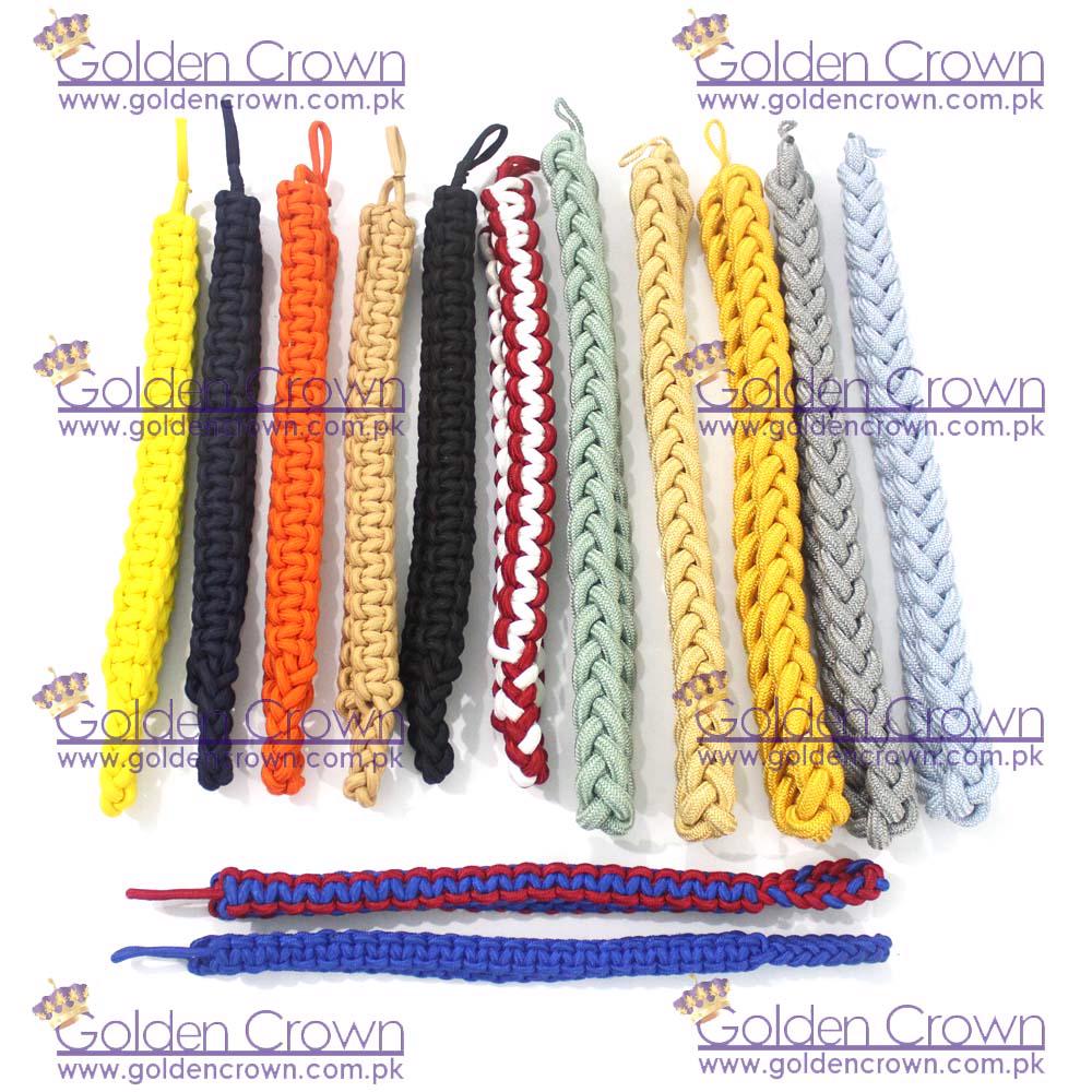 Product image - A military shoulder cord is a braided, decorative cord worn on the shoulder of a military uniform. These cords are often used to signify specific achievements, honors, or assignments within the military. https://goldencrown.com.pk/products/c1095_GROUP-PRODUCTS/i13814_Military-Shoulder-Cord-Braided-Shoulder-Cord-Supplie.aspx
 